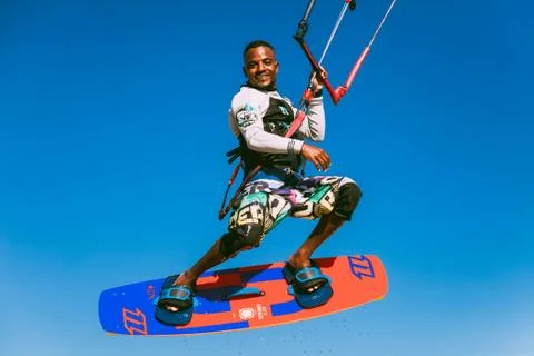 The smiling kiter in the sky over the Red sea. Stock Photos