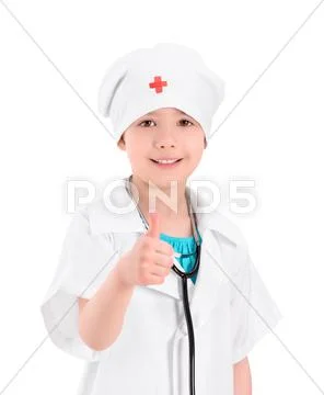 Smiling little doctor showing thumb up Stock Photos