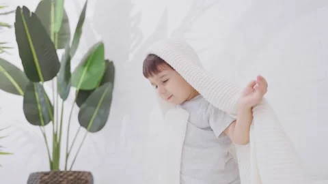 Smiling Little Kid Playing Under Cover in The Bed Stock Footage 244341902