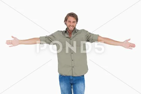 Smiling man with arms open wide Stock Photos