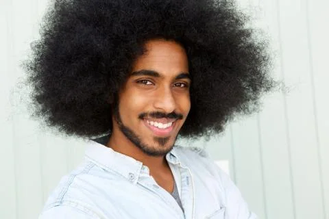 Smiling man with beard and afro 스톡 사진