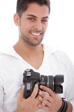 Smiling man with a digital camera Foto stock