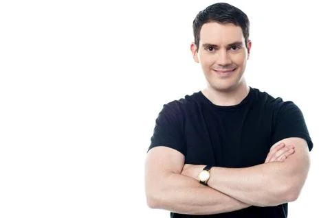Smiling man with folded arms Stock Photos