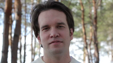 Smiling Man on the Forest Background 스톡 동영상 53851792