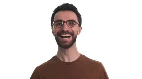 The smiling man in glasses posing on camera. slow motion Video stock 150722578