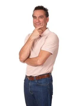 Smiling man with hand to face Foto stock