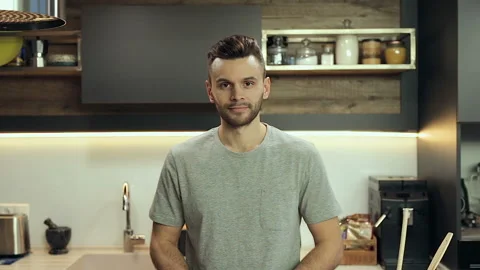 Smiling man idoors. Looking at camera. Stock Footage 100421338