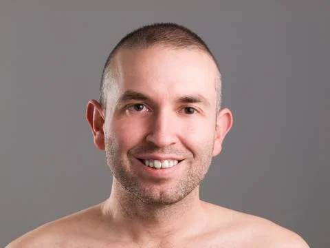 Smiling man looking at camera Foto stock