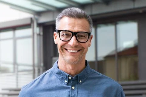 Smiling Man Portrait At Workplace Stock Photos