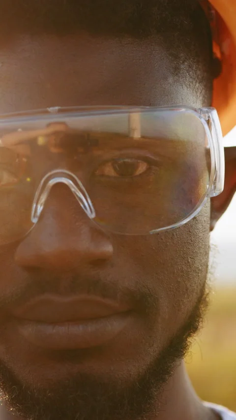 Smiling Man with Safety Glasses Stock Footage 318681958