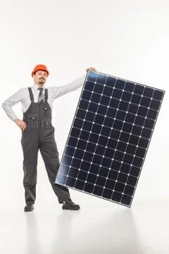 Smiling man solar panel isolated white background Stock-Fotos