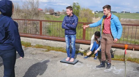 Smiling man standing on a board with nails Stock Footage 68348703