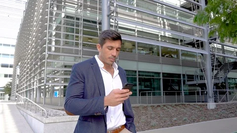 Smiling man texting, slow motion modern business man Stock Footage 96049455