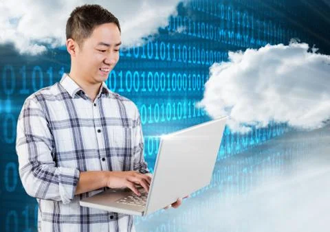 Smiling man using laptop with clouds and binary codes in background Stock Photos
