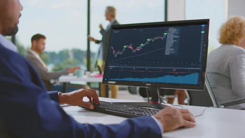 Smiling man working on computer Stock Footage 164647536