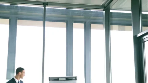 Smiling manager giving presentation to colleagues Stock Footage 59544022