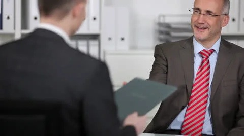 Smiling manager in a job interview Stock-Footage 26981989