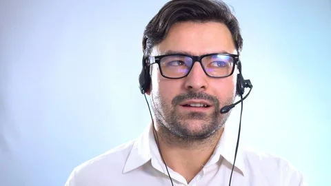 Smiling men working at Customer service support in the office. Professional Stock Footage 106273319