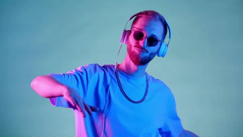 Smiling Model Dancing Alone Looking At Clouse-Up Camera Neon Light Studio Stock Footage 170193247