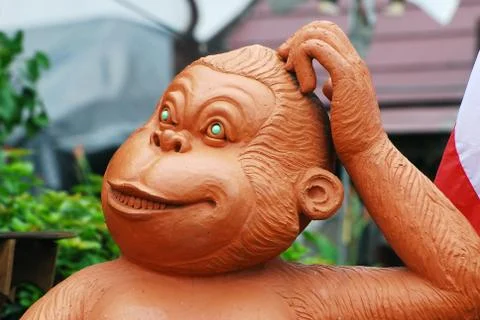 Smiling monkey statue Foto stock