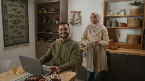 Smiling Muslim Couple Posing Together in Modern Home Kitchen Stock Footage 331828840