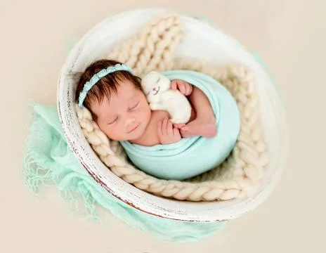 Smiling newborn sleeping Stock Photos