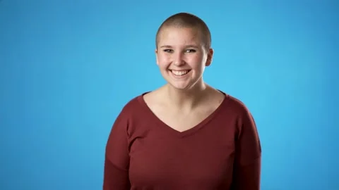 Smiling nod head look around pretty gender fluid non binary young woman 20s 30s Stock Footage 223260622