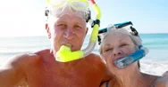 Smiling Old Retired Couple With Mask And Snorkel Stock Footage