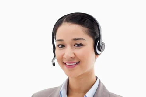 Smiling operator posing with a headset Stock Photos