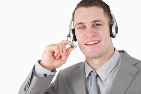Smiling operator using a headset Stock Photos