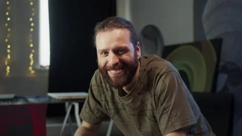 A smiling painter is looking at the camera Stock Footage 155905297