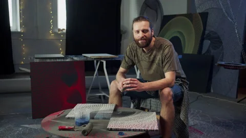 A smiling painter is looking at the camera Video stock 156303904