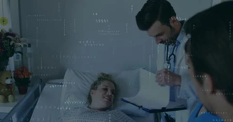 Smiling patient in patterned gown lying on adjustable bed, doctor in white coat Stock Photos