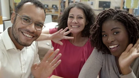 Smiling people posing for self portrait at library 스톡 동영상 117314143