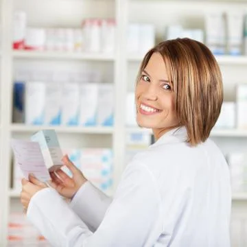 Smiling pharmacist Stock Photos