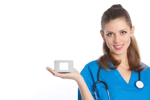 Smiling physician with box Stock Photos