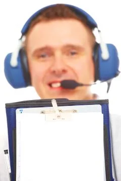 Smiling pilot showing kneepad Stock Photos