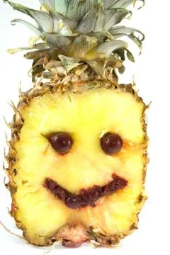 Smiling pineapple Stock Photos