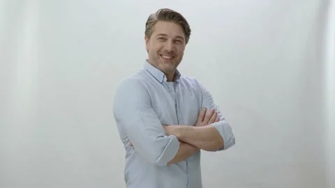 Smiling positive strong man posing for camera. Stock Footage 198362543