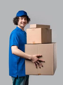 Smiling Postal Courier, Porter Man With Parcel Box. Happy Handyman Delivering Stock Photos