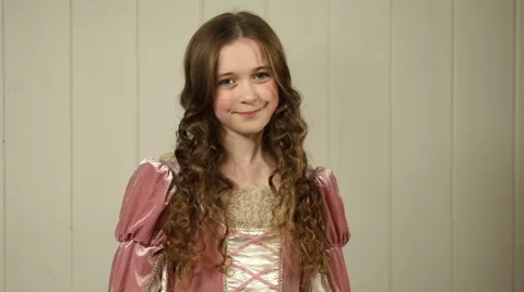 A smiling princess poses for the camera Stock Footage 44116146
