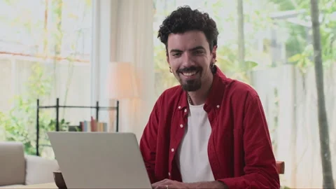 Smiling Programmer Working on Laptop from Home Stock-Footage 253496702