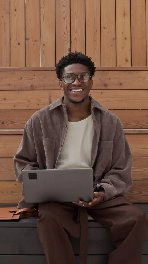 Smiling Programmer Working in Local Park Stock Footage 320002779