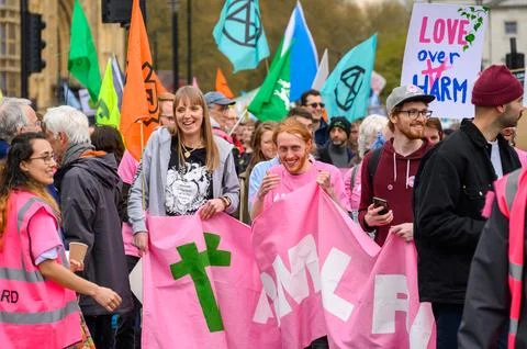 Smiling Protesters: Banners and Flags Stock Photos