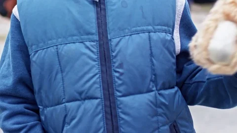 Smiling Refugee Boy with Plush Bear Stock Footage 78737906