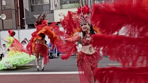Smiling Samba Dancer in Red Feather Backpiece, Asakusa Carnival Stock Footage 346933813