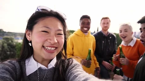 Smiling selfie of cheerful group of young people. Happy friends video call Stock Footage 185478148