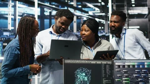 Smiling server hub engineers using AI algorithms and node tree systems Stock Footage 309111086