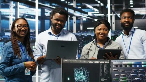 Smiling server hub engineers using AI algorithms and node tree systems Foto stock