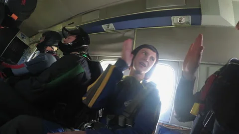 Smiling Skydivers Preparing for a Parachute Jump. 4K Stockbeeldmateriaal 155065037